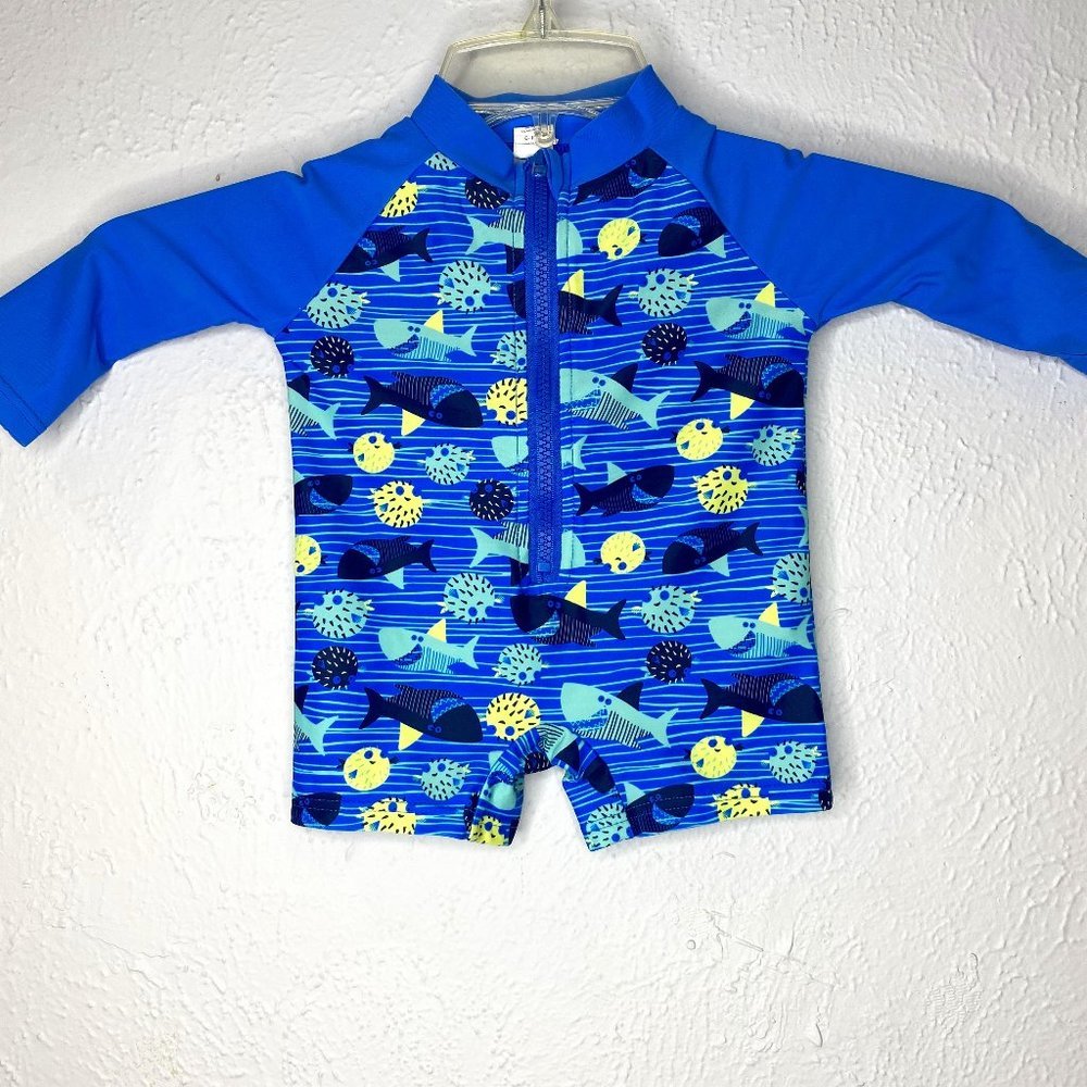Baby boy 6-12M, sun and surf body suit rash guard in blue, black and yellow.